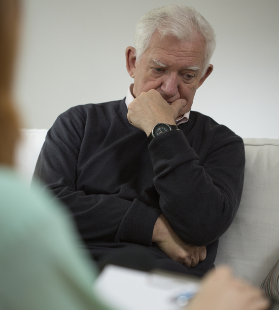 Senior man with depression during visit in psychiatrist